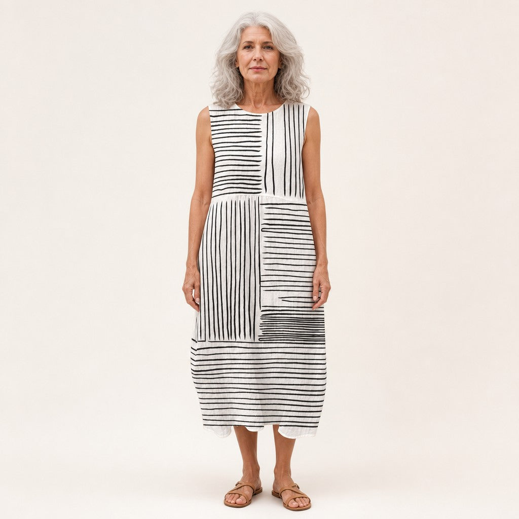 Anouk | Mouwloze midi-jurk met zwart-witte streepvlakken