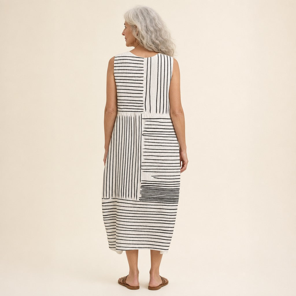 Anouk | Mouwloze midi-jurk met zwart-witte streepvlakken