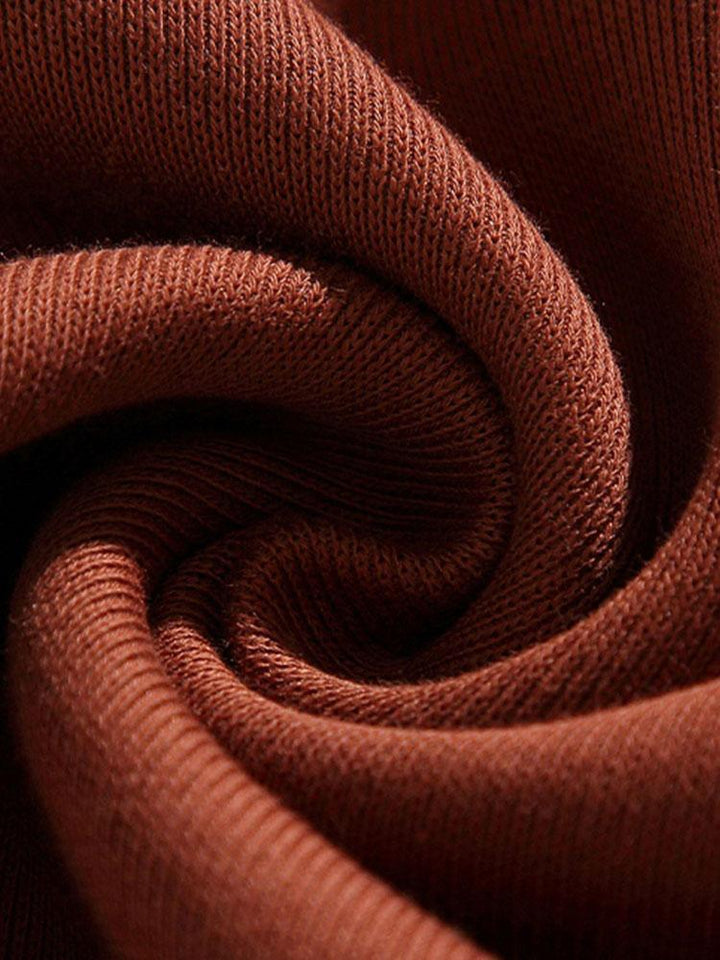 Jan | Polosweater met patchworkdetails en kleurvlakken en relaxte pasvorm