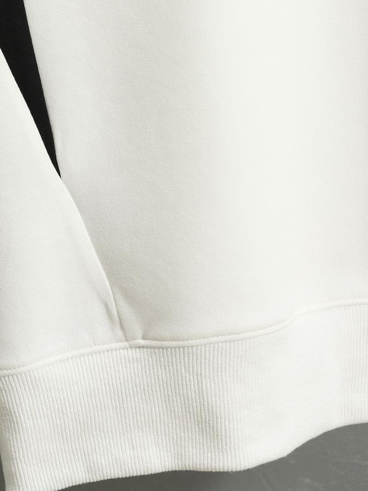Remco | Oversized racesweater met tekstopdruk en kleurvlakken