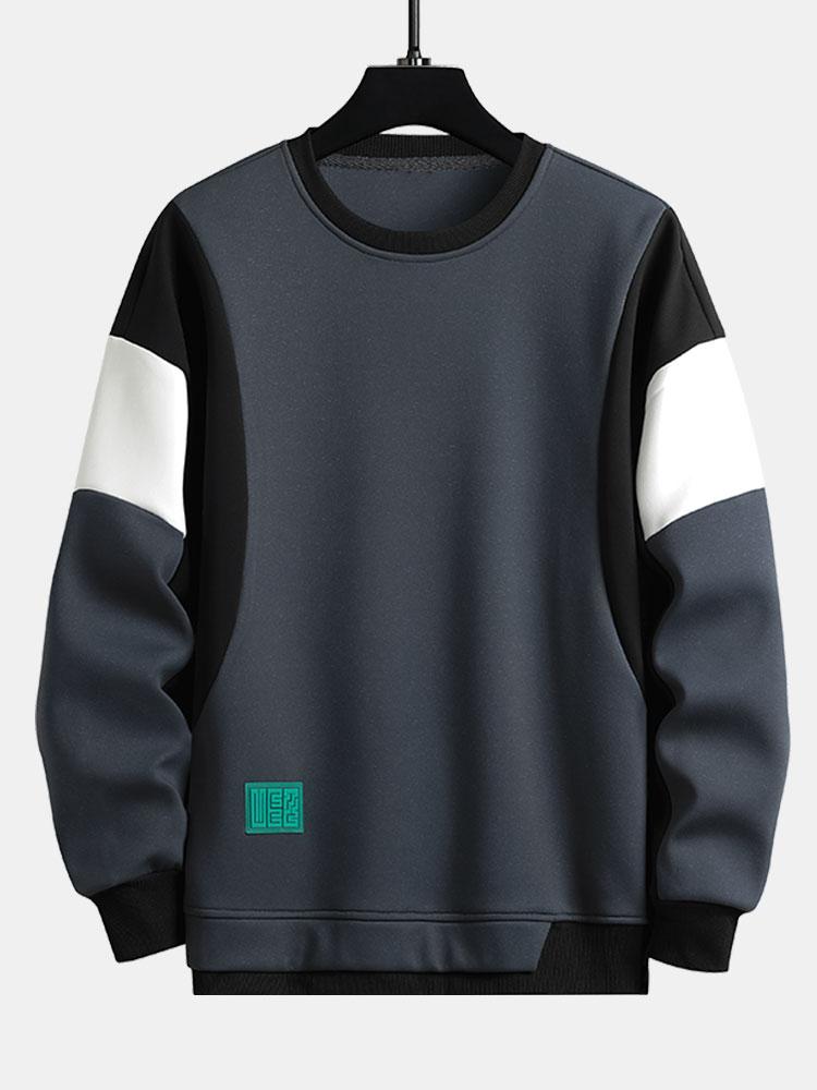 Levi | Sweater met patchworkdetails en kleurvlakken