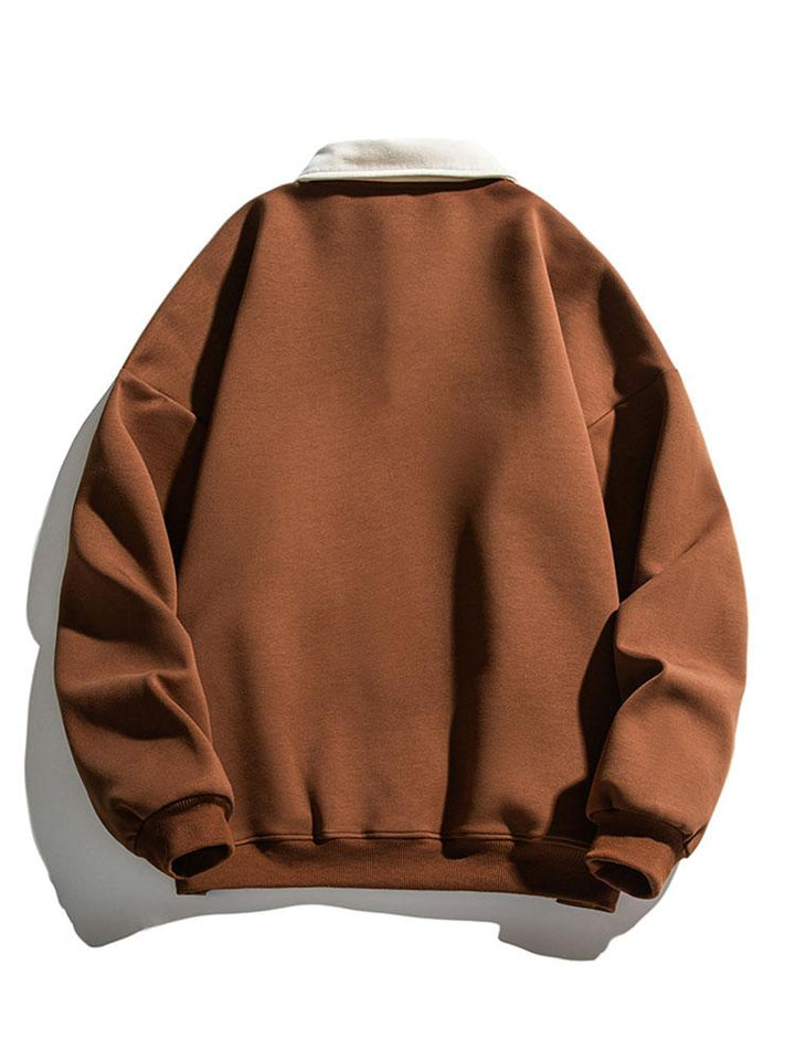 Rein | Polosweater met contrastdetails en relaxte pasvorm