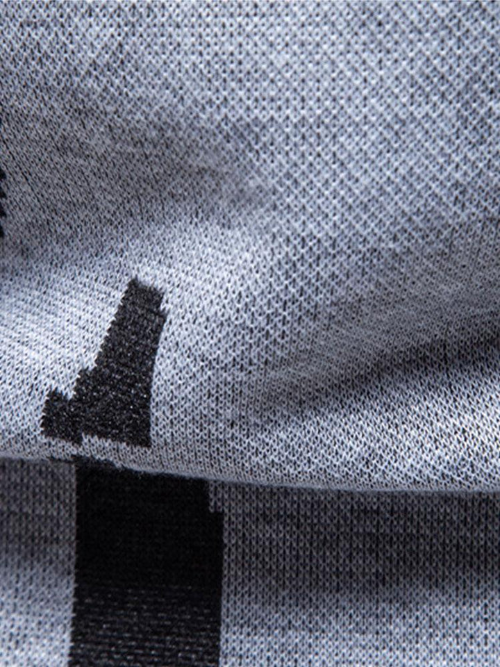 Luuk | Trui met abstracte print en opstaande kraag