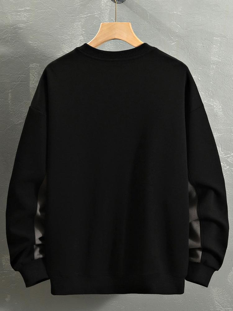 Hugo | Oversized sweater met tekstopdruk en kleurvlakken