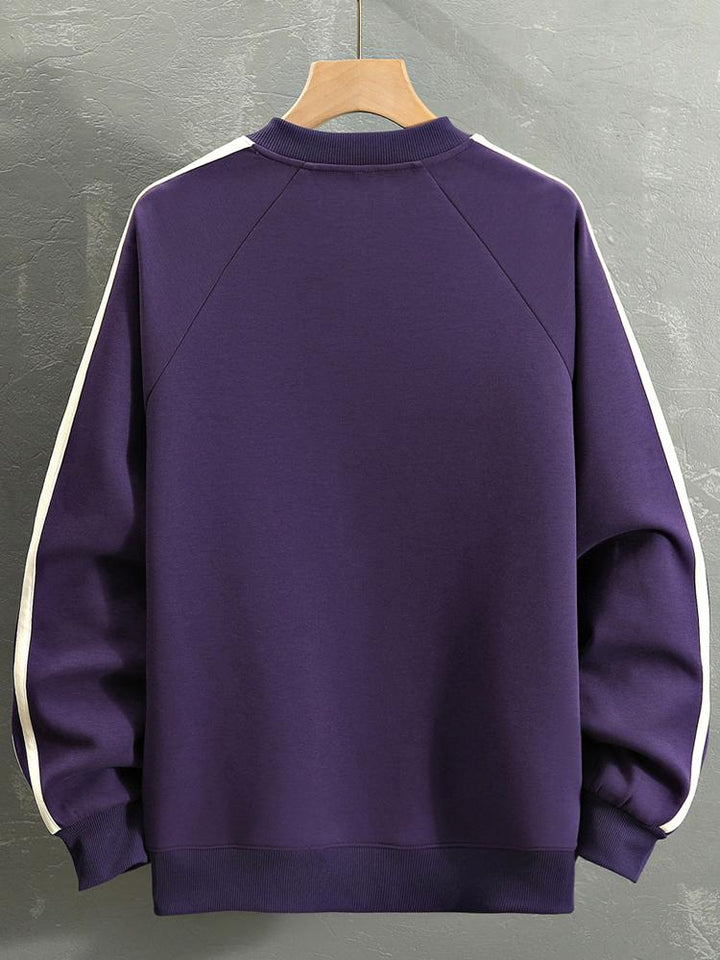 Remco | Oversized racesweater met tekstopdruk en kleurvlakken