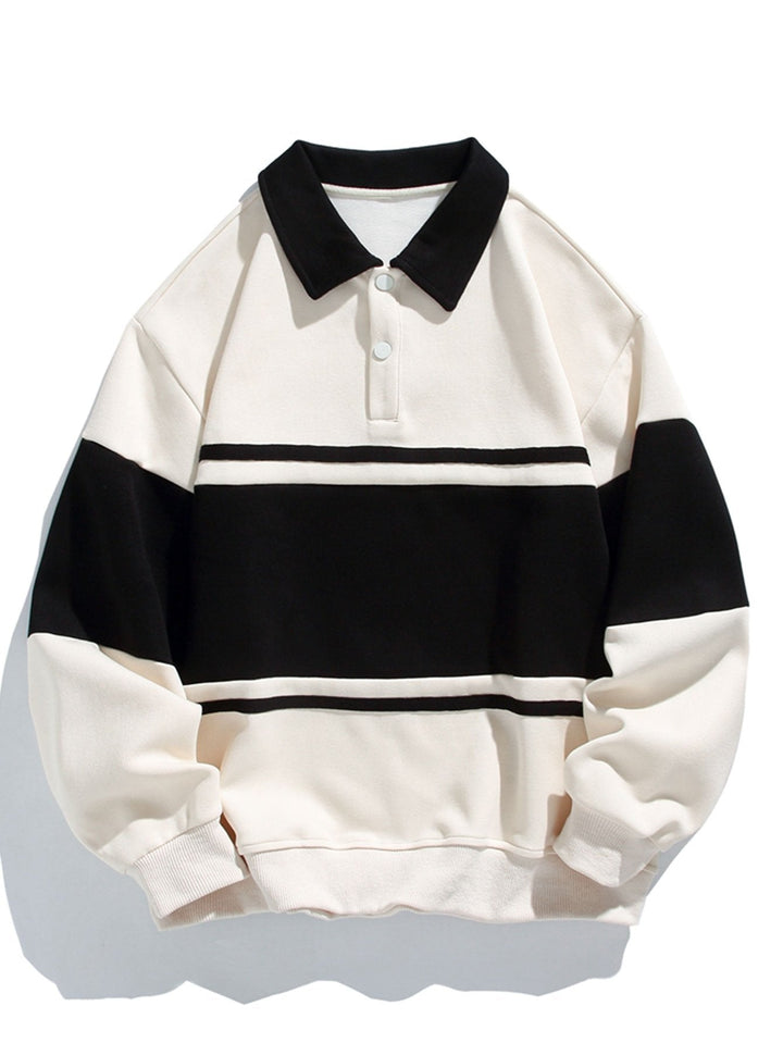 Jan | Polosweater met patchworkdetails en kleurvlakken en relaxte pasvorm