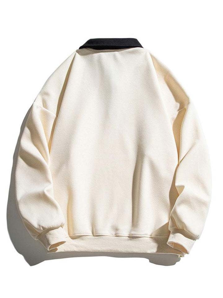 Rein | Polosweater met contrastdetails en relaxte pasvorm