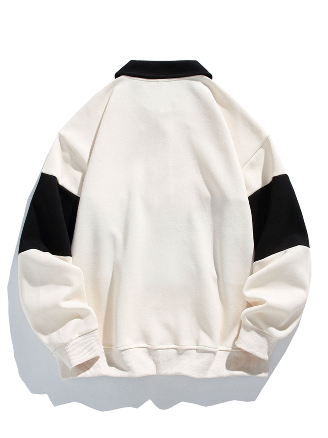 Jan | Polosweater met patchworkdetails en kleurvlakken en relaxte pasvorm