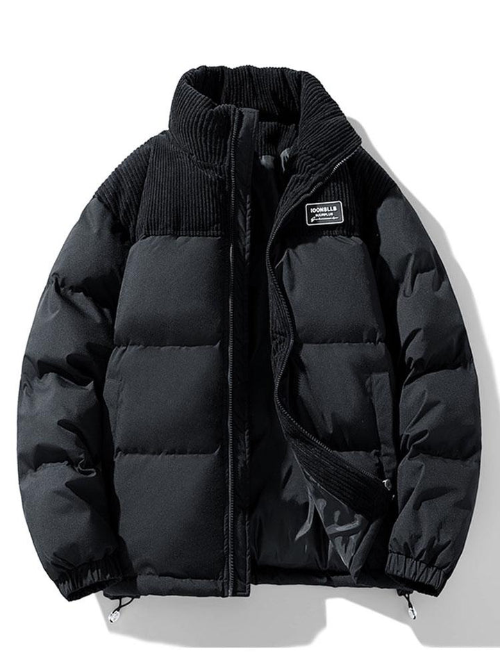 Patrick | Puffer jas met corduroy paneeldetails