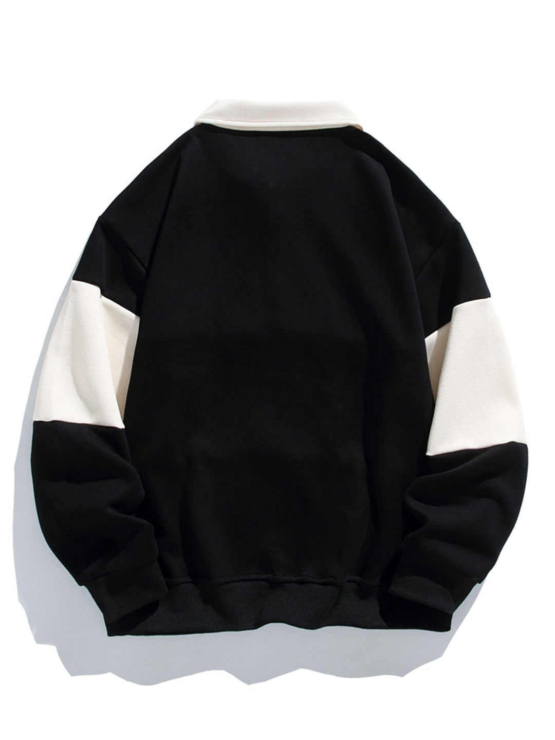 Jan | Polosweater met patchworkdetails en kleurvlakken en relaxte pasvorm