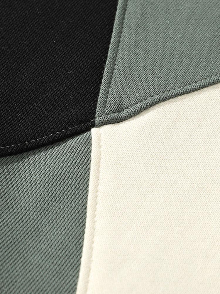 Pieter | Sweater met patchworkdetails en kleurvlakken