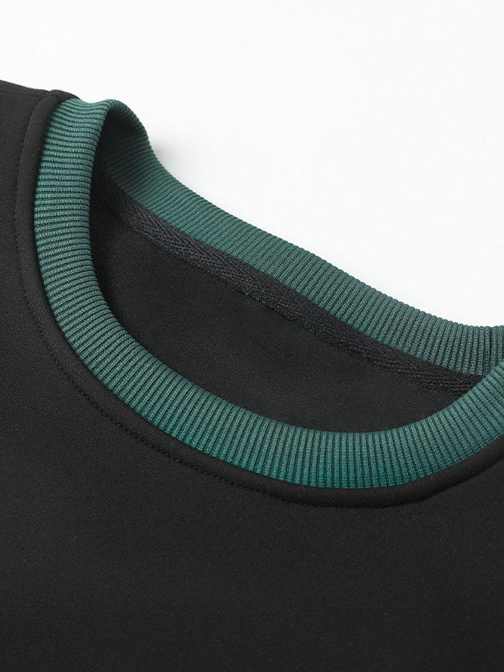 Levi | Sweater met patchworkdetails en kleurvlakken