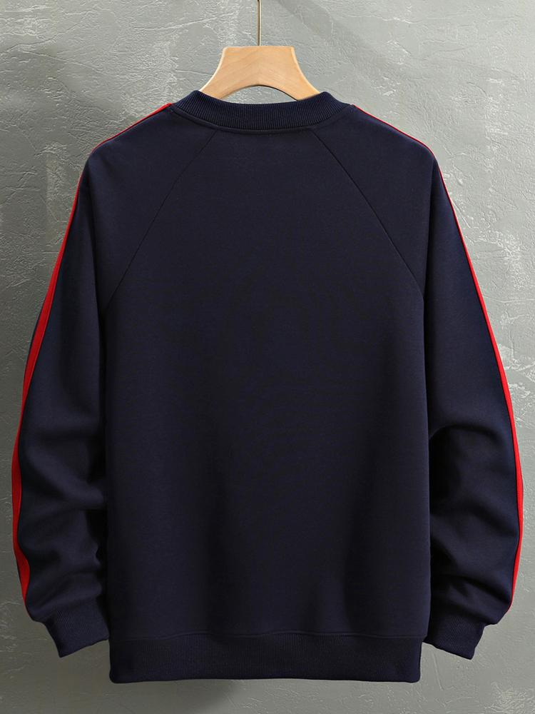 Remco | Oversized racesweater met tekstopdruk en kleurvlakken