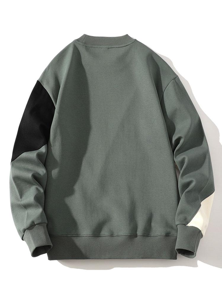 Pieter | Sweater met patchworkdetails en kleurvlakken