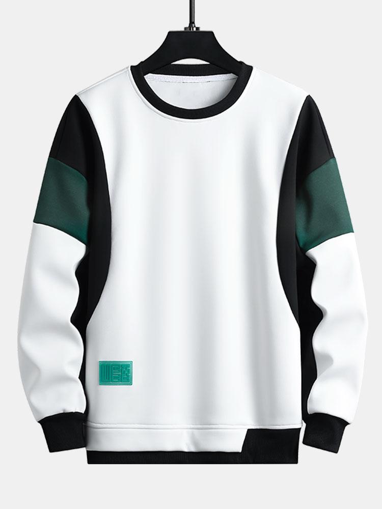 Levi | Sweater met patchworkdetails en kleurvlakken