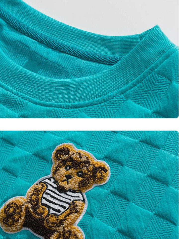 Gerard | Sweater met geborduurde beer en schaakbordjacquard en relaxte pasvorm