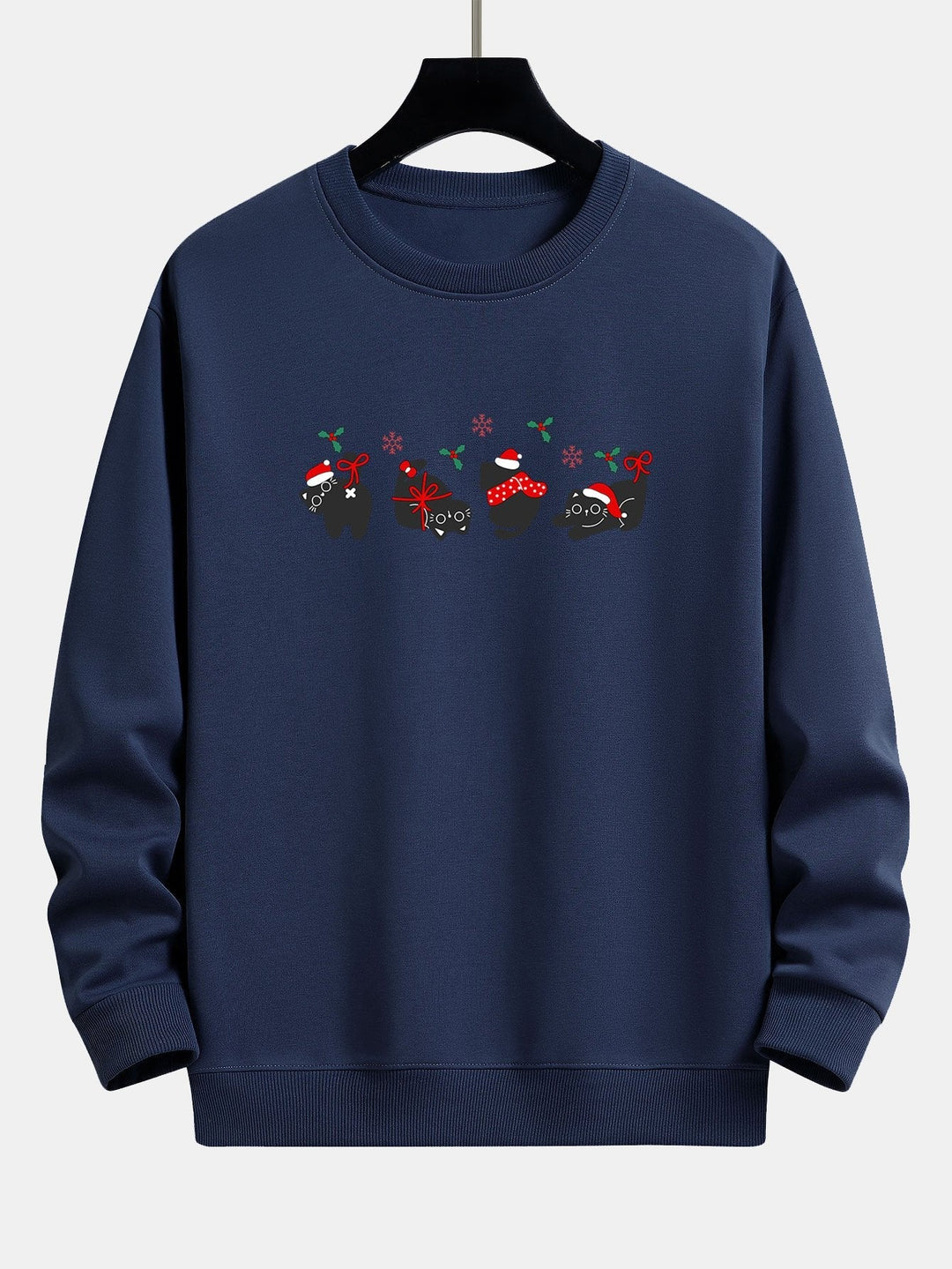 Oscar | Kerstsweater met zwarte kattenprint en relaxte pasvorm