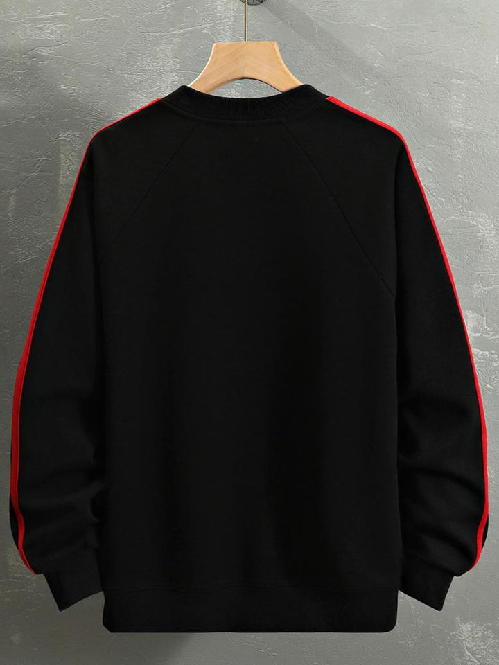 Remco | Oversized racesweater met tekstopdruk en kleurvlakken
