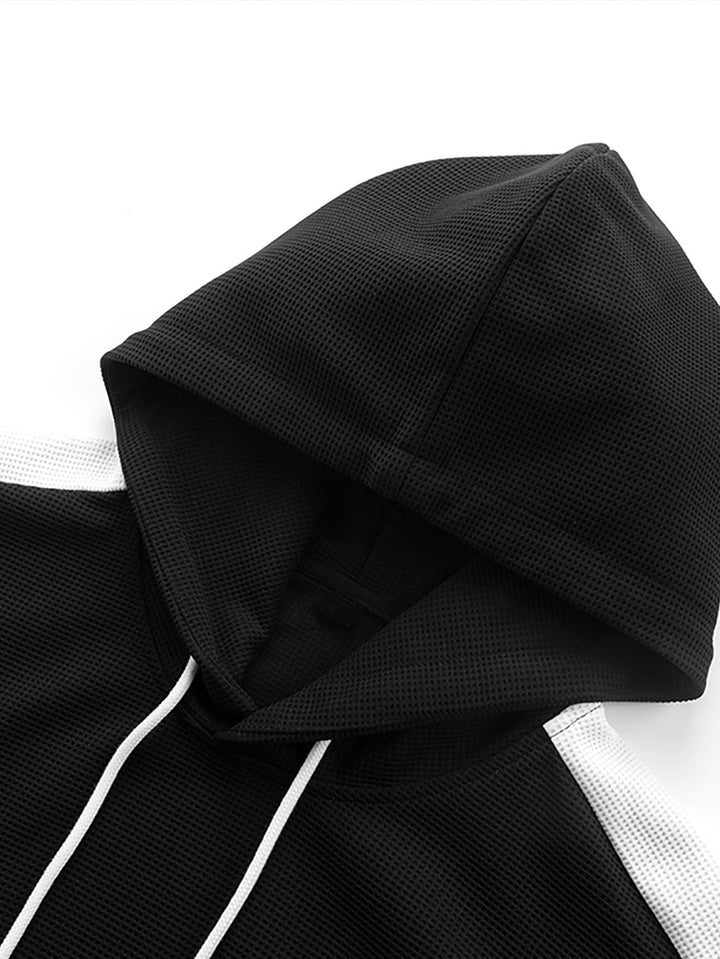 Rijk | Hoodie met kleurvlakken en wafelstructuur