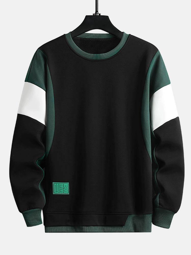 Levi | Sweater met patchworkdetails en kleurvlakken