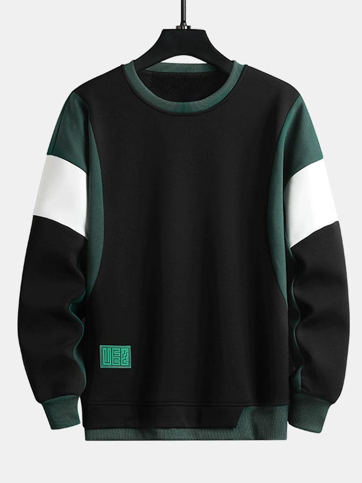Levi | Sweater met patchworkdetails en kleurvlakken
