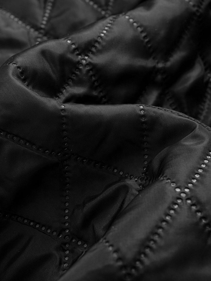 Marco | Gewatteerde corduroy jas met capuchon