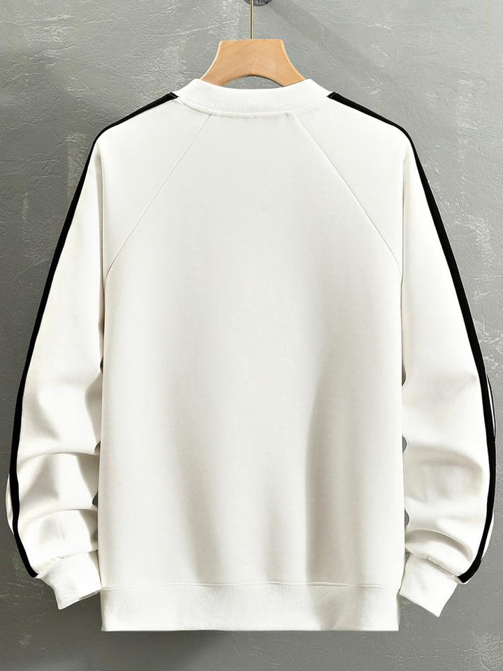 Remco | Oversized racesweater met tekstopdruk en kleurvlakken