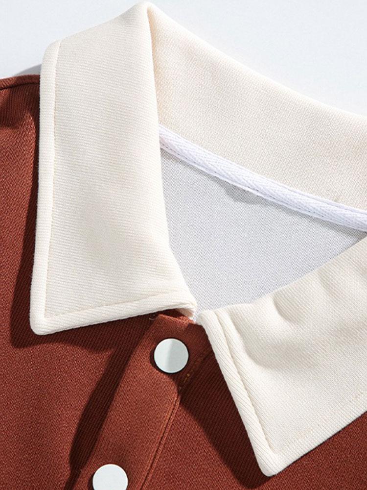 Jan | Polosweater met patchworkdetails en kleurvlakken en relaxte pasvorm