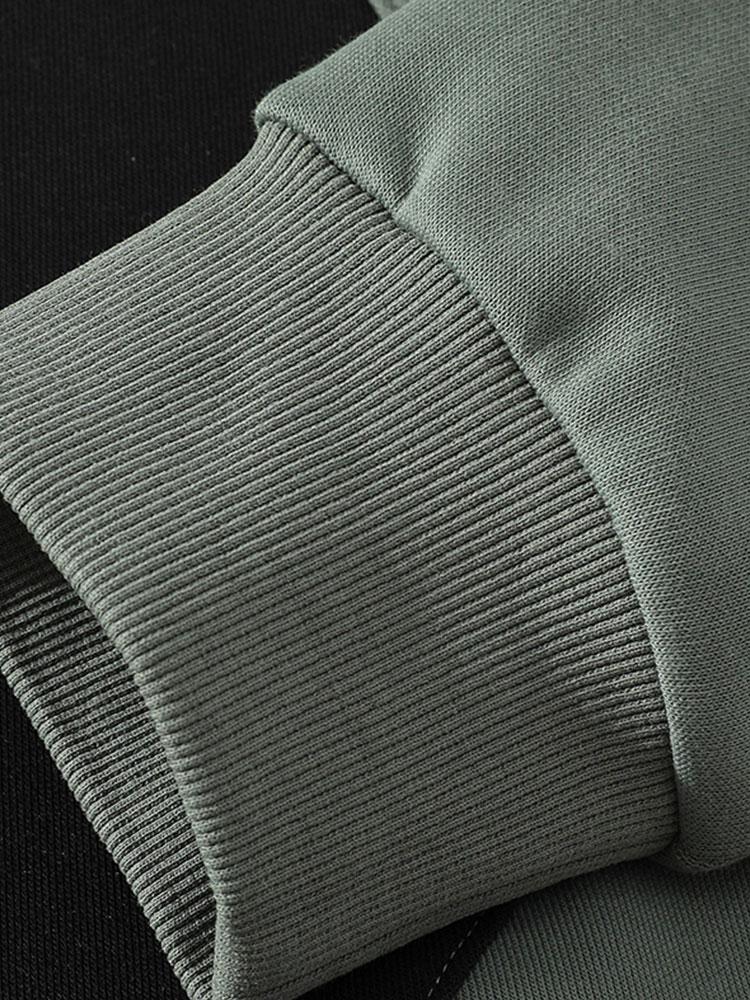 Pieter | Sweater met patchworkdetails en kleurvlakken