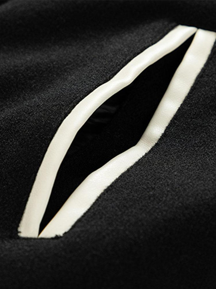 Yannick | Baseball jack met wolachtige pu-mouwen en contrastdetails