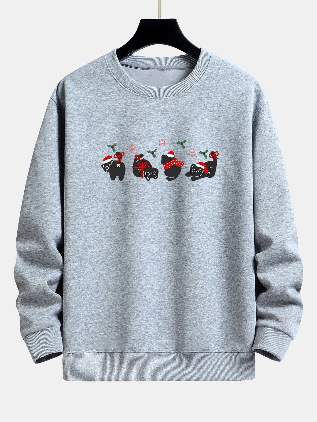 Oscar | Kerstsweater met zwarte kattenprint en relaxte pasvorm