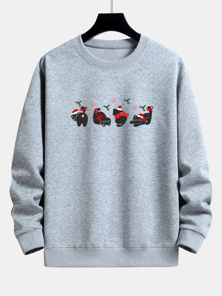 Oscar | Kerstsweater met zwarte kattenprint en relaxte pasvorm