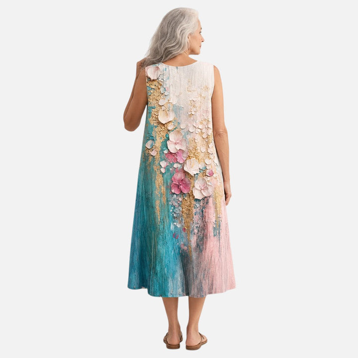 Yvonne | Mouwloze midi-jurk met geschilderde bloemen