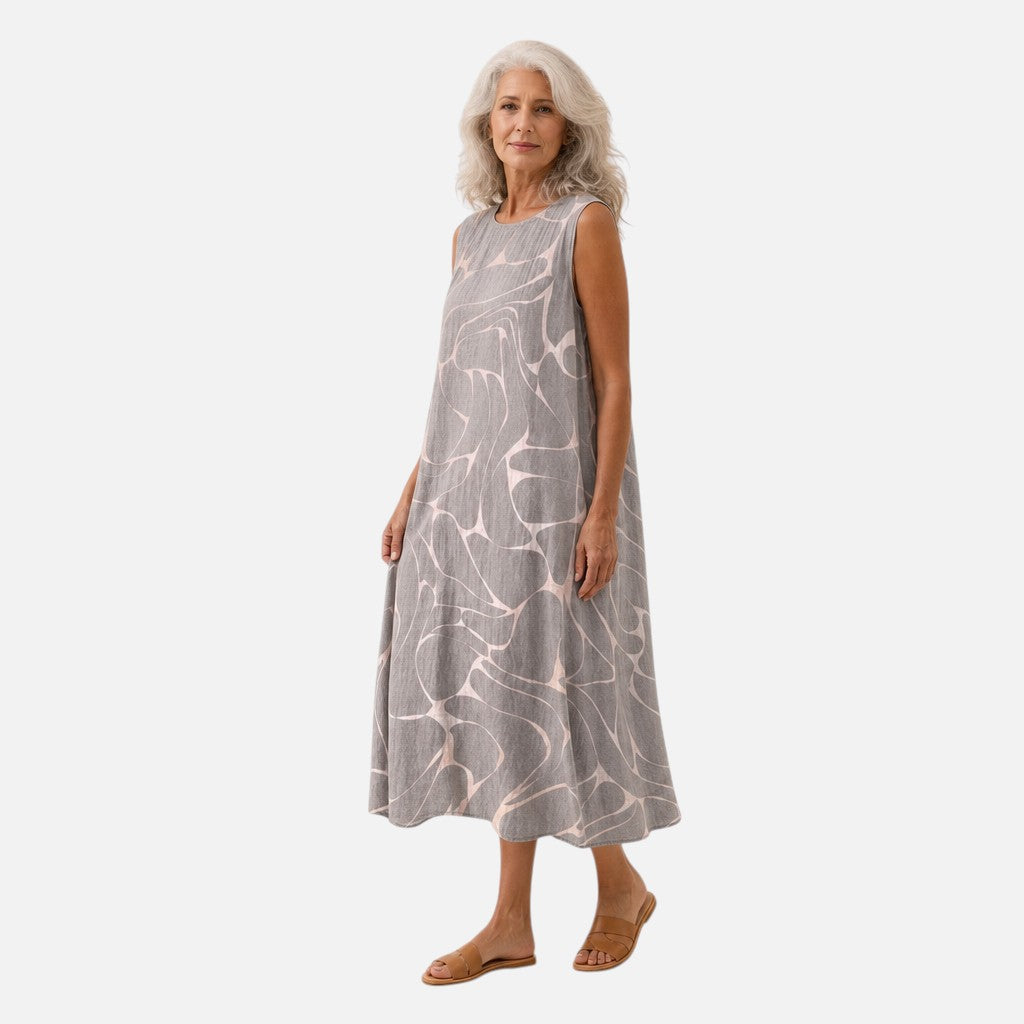 Margriet | Mouwloze midi-jurk met abstract vogelpatroon in grijs