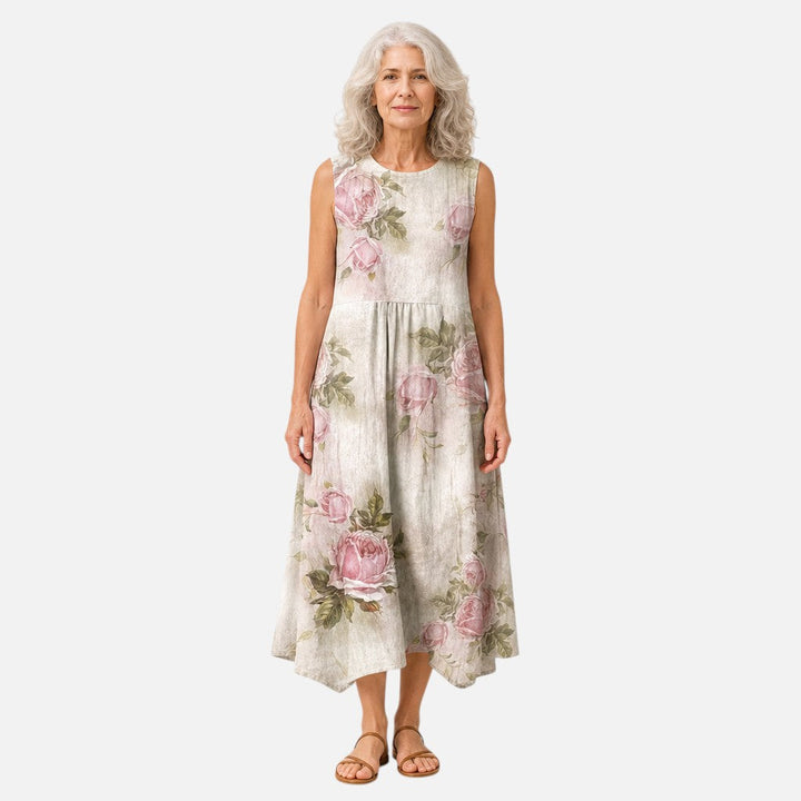 Noor | Mouwloze midi-jurk met oudroze rozen op crème