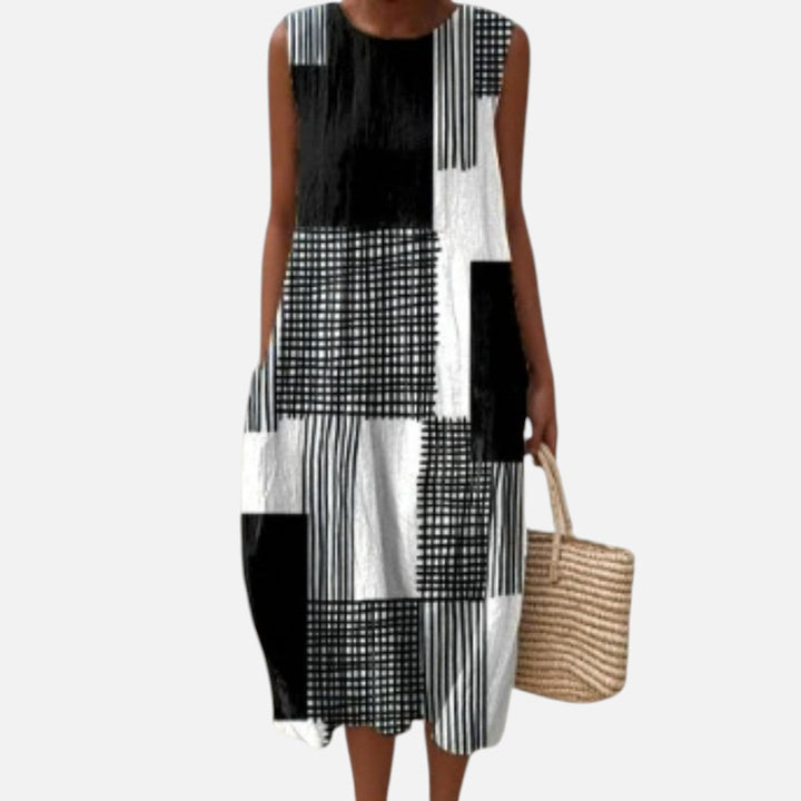 Nienke | Mouwloze midi-jurk met zwart-wit patchwork