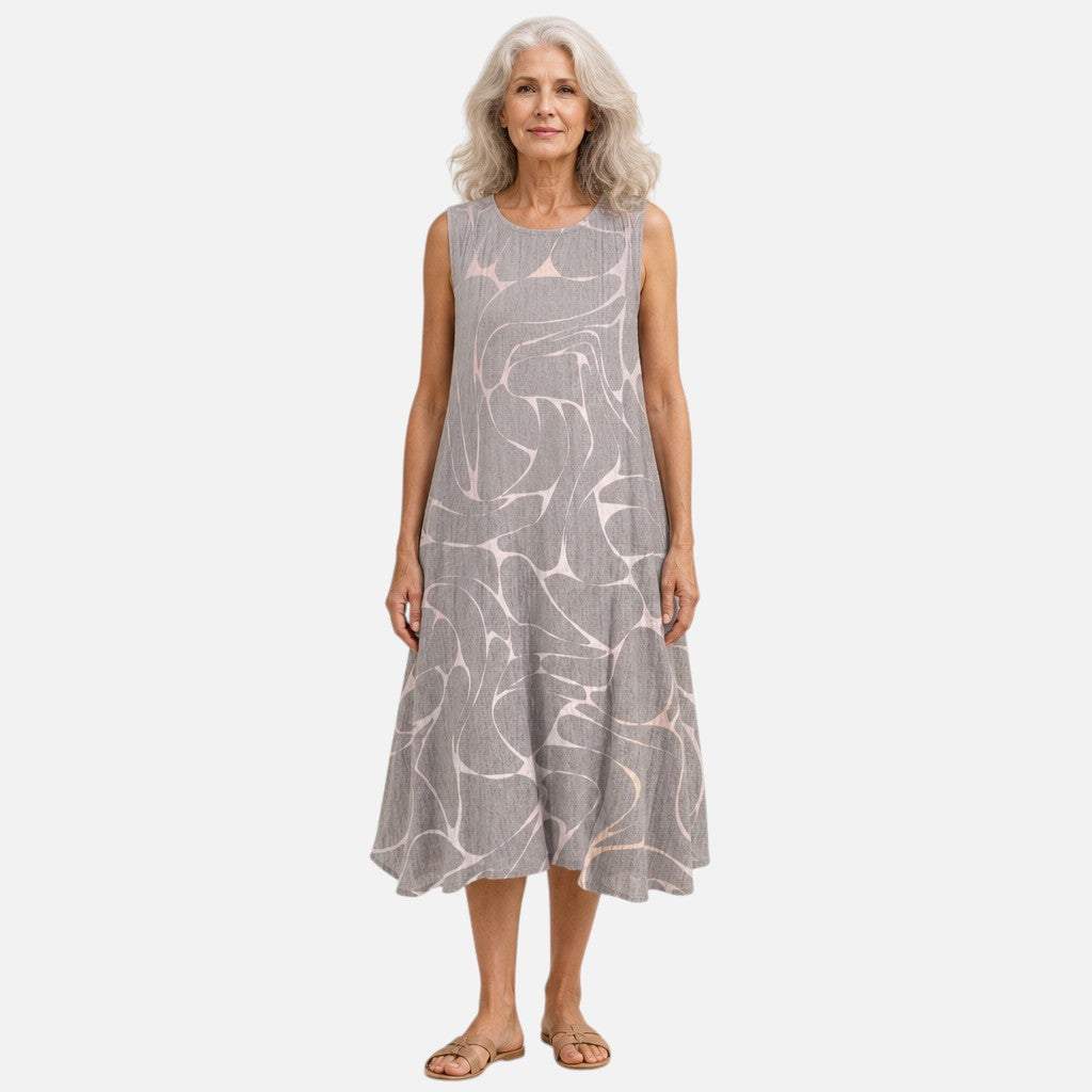 Margriet | Mouwloze midi-jurk met abstract vogelpatroon in grijs