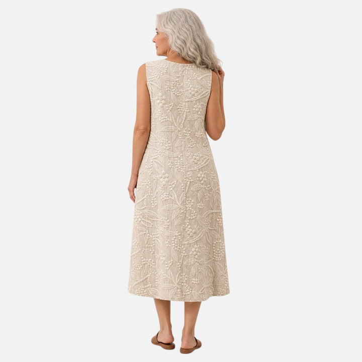 Marieke | Mouwloze midi-jurk met bladstructuur