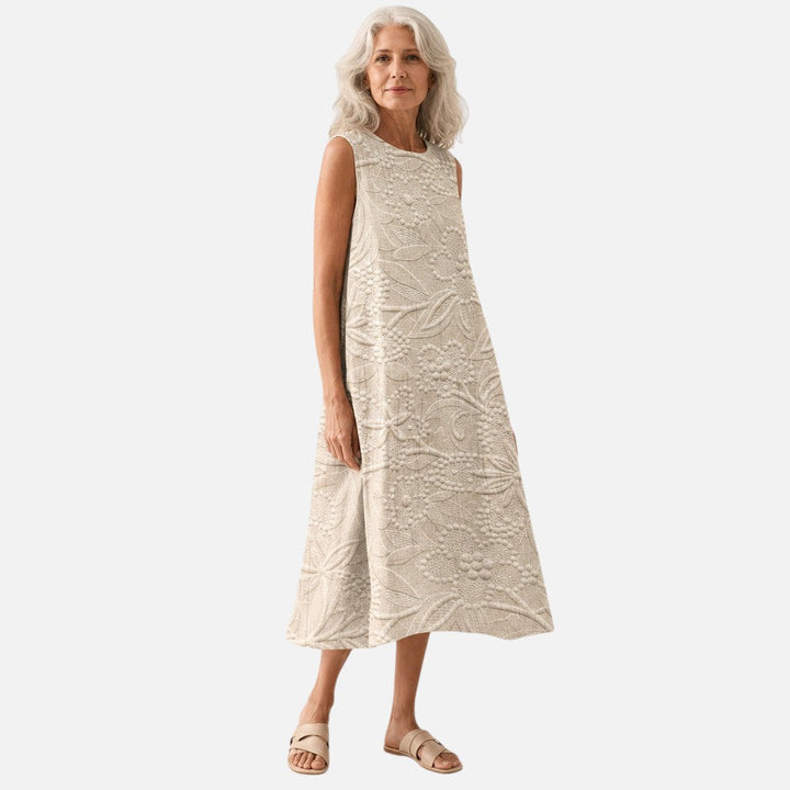 Marieke | Mouwloze midi-jurk met bladstructuur