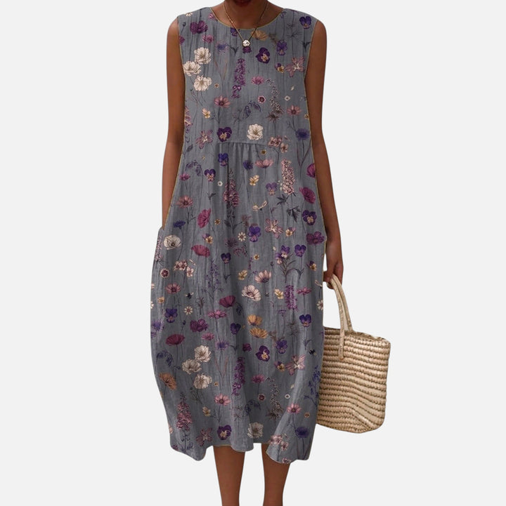 Lieke | Mouwloze midi-jurk met kleine bloemen op grijs