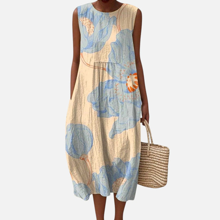 Renske | Mouwloze midi-jurk met grote blauwe bloemen