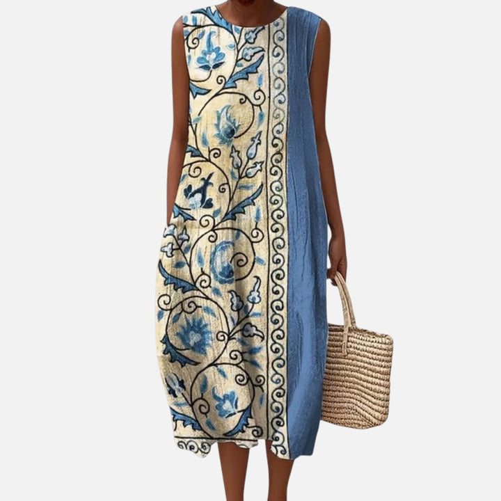 Marjolein | Mouwloze midi-jurk met blauwe bloemenbordure