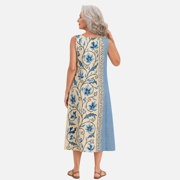 Marjolein | Mouwloze midi-jurk met blauwe bloemenbordure