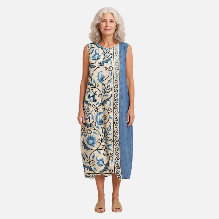 Marjolein | Mouwloze midi-jurk met blauwe bloemenbordure