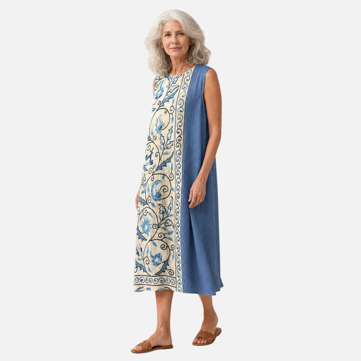 Marjolein | Mouwloze midi-jurk met blauwe bloemenbordure
