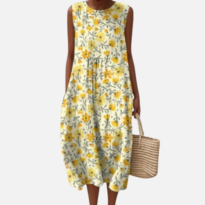Daphne | Mouwloze midi-jurk met kleine gele bloemen