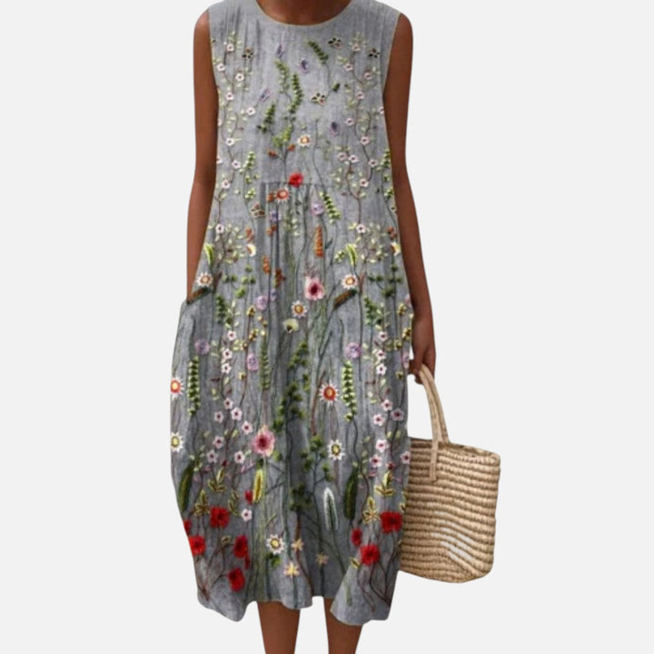 Sanne | Mouwloze midi-jurk met bloemenprint in borduurlook