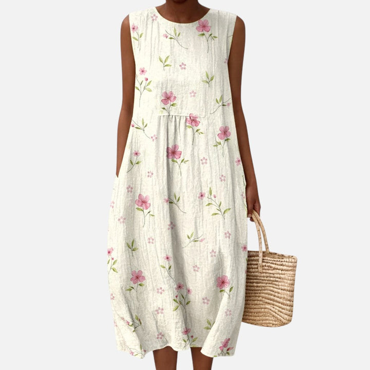 Carla | Mouwloze midi-jurk met kleine roze bloemen