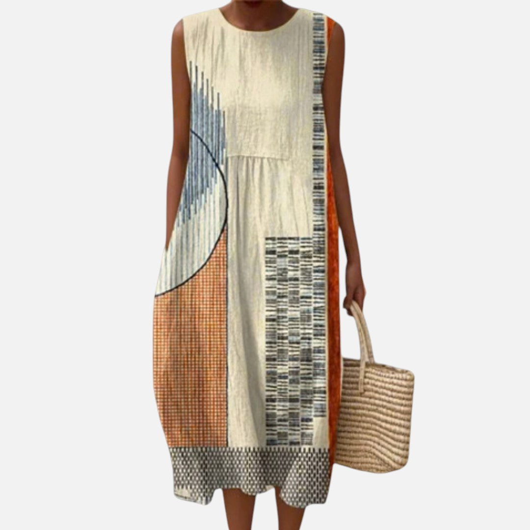 Greet | Mouwloze midi-jurk met grafische patchworkprint