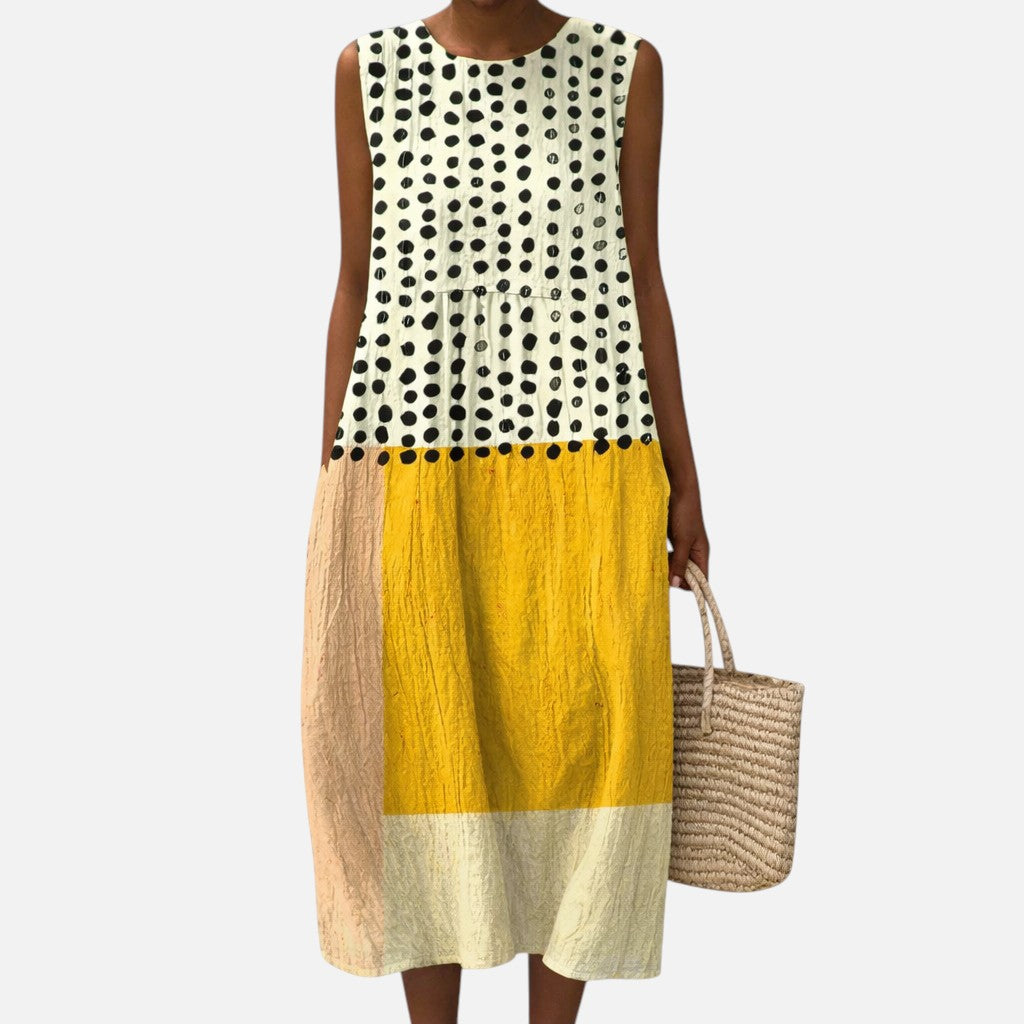 Jasmijn | Mouwloze midi-jurk met stippen en kleurvlakken